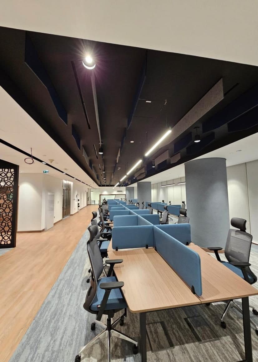 Hazardous Materials Management Centre — open workspace with acoustic ceiling